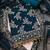 ethnic motifs embroidered sequinned unstitched dress material