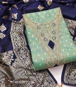 women sea green embroidered unstitched dress material