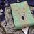 women sea green embroidered unstitched dress material