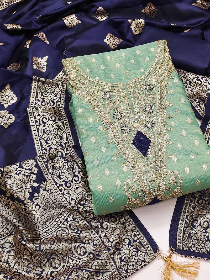 women sea green embroidered unstitched dress material