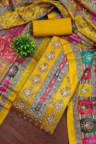 women mustard printed geometric dress material
