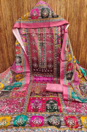 women pink printed geometric dress material