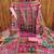 women pink printed geometric dress material
