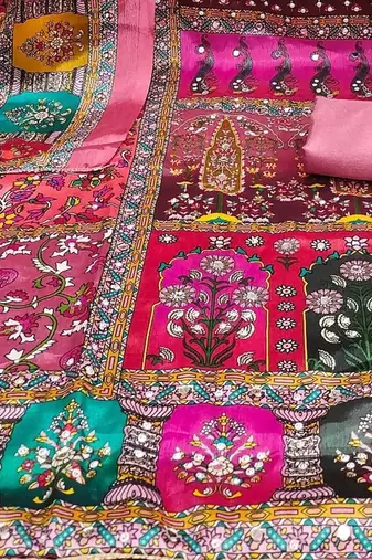 women pink printed geometric dress material