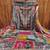 women grey printed geometric dress material
