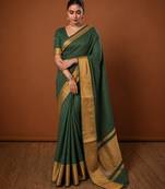 Women's purple & golden zari woven kanjivaram style silk blend saree with blouse piece