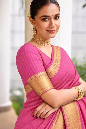Women's pink & golden zari woven kanjivaram style silk blend saree with blouse piece