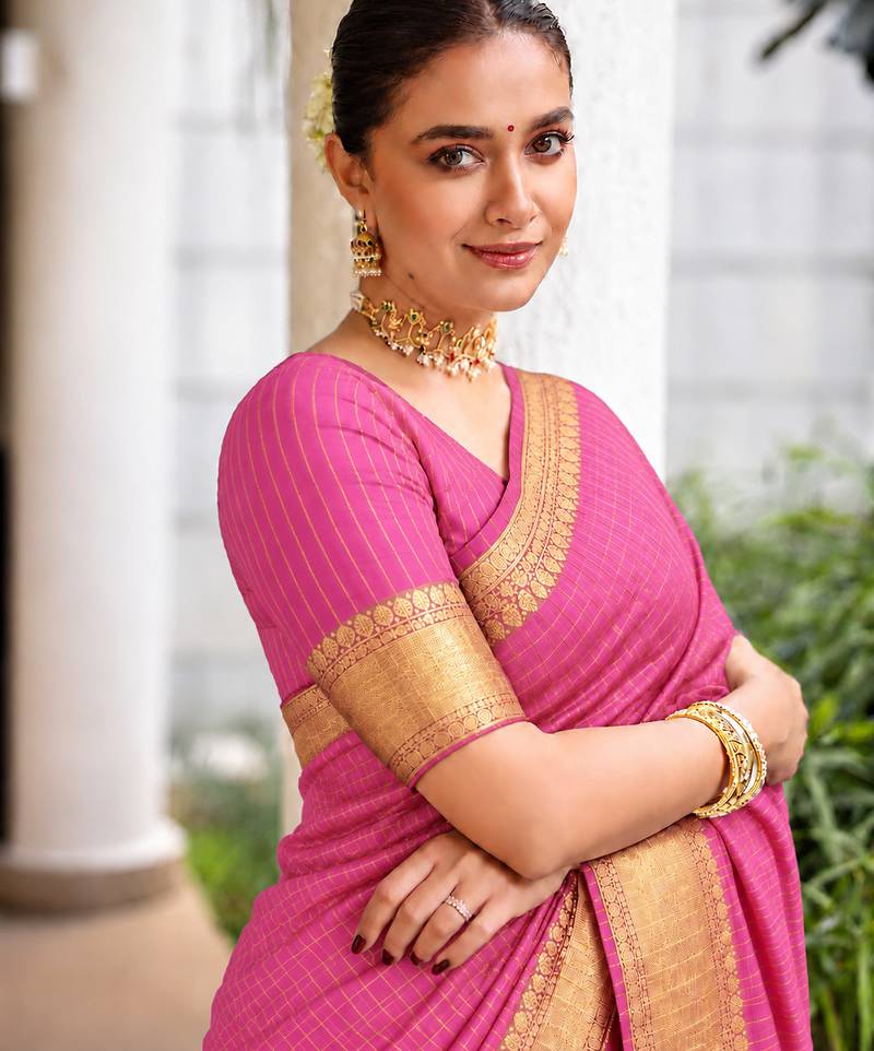 Women's pink & golden zari woven kanjivaram style silk blend saree with blouse piece