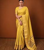 Women's yellow & golden zari woven kanjivaram style silk blend saree with blouse piece