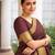 Women's brown & golden zari woven kanjivaram style silk blend saree with blouse piece