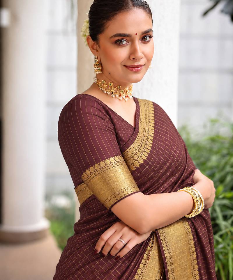 Women's brown & golden zari woven kanjivaram style silk blend saree with blouse piece
