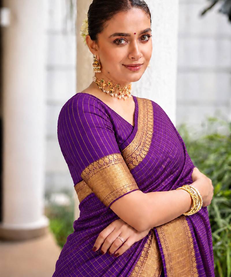 Women's violet & golden zari woven kanjivaram style silk blend saree with blouse piece
