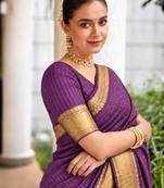 Women's wine & golden zari woven kanjivaram style silk blend saree with blouse piece