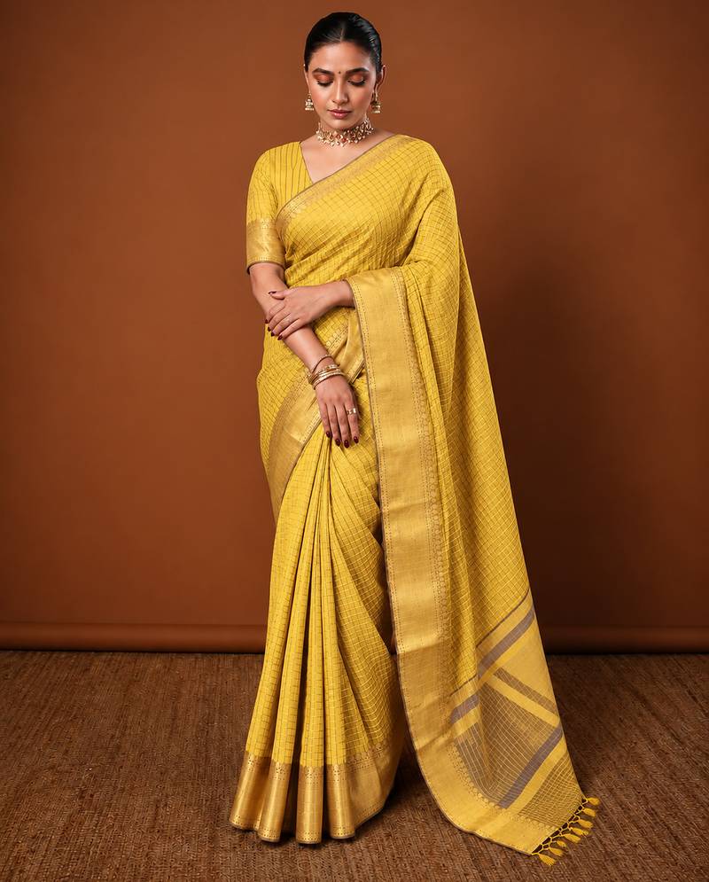 Women's yellow & golden zari woven kanjivaram style silk blend saree with blouse piece