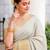 Women's grey & golden zari woven kanjivaram style silk blend saree with blouse piece