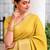 Women's yellow & golden zari woven kanjivaram style silk blend saree with blouse piece