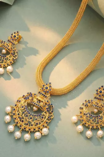 Gold tone statement necklace set for women with royal blue crystal