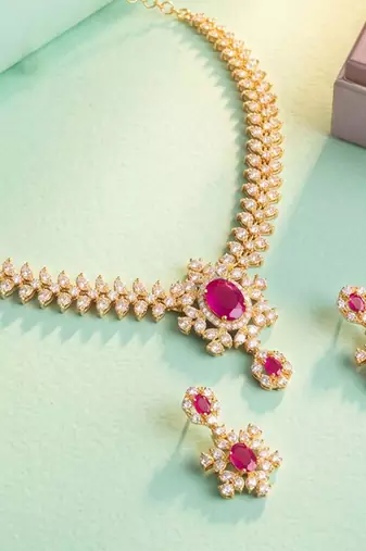 Gold tone statement necklace set for women, pink crystal pendant