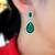 Silver plated cubic zirconia & green crystal studded drop earrings