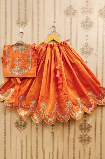 Tie and dye krishna embroidered silk lehenga choli
