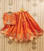 Tie and dye krishna embroidered silk lehenga choli