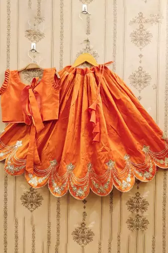 Tie and dye krishna embroidered silk lehenga choli