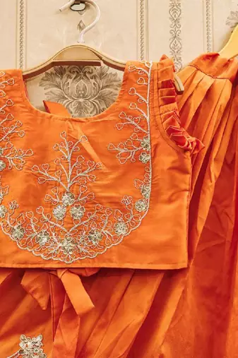 Tie and dye krishna embroidered silk lehenga choli