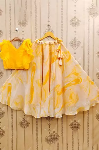 Girls yellow tie and dye printed v neck georgette blouse & lehenga