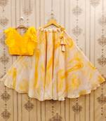 Girls yellow tie and dye printed v neck georgette blouse & lehenga