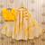 Girls yellow tie and dye printed v neck georgette blouse & lehenga