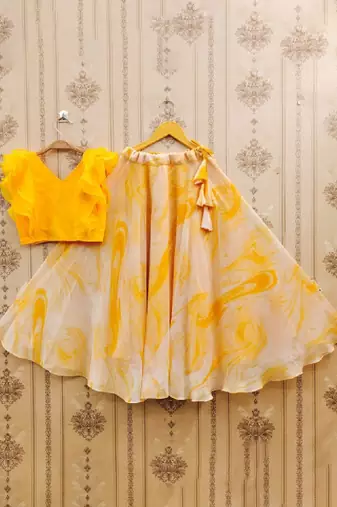 Girls yellow tie and dye printed v neck georgette blouse & lehenga