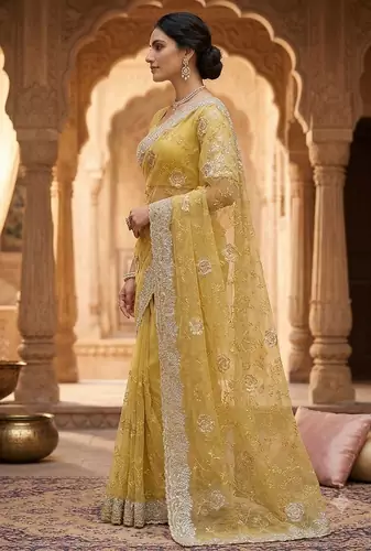 fancy light  mustrard thread with stone handwork saree