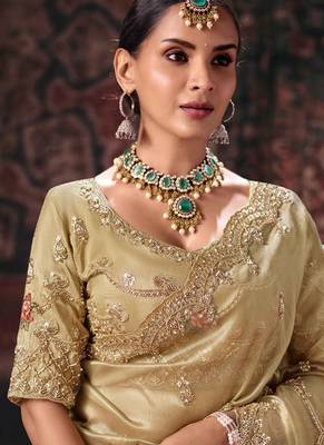 beige kanjivaram silk heavy embroidery beads party wear saree 2