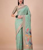 Green geometric woven design zari banarasi saree