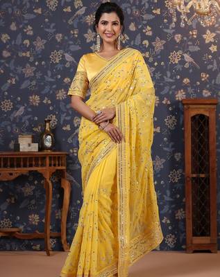 Yellow sequinned embellished saree with blouse piece 1
