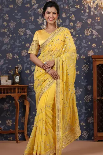 Yellow sequinned embellished saree with blouse piece