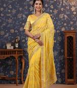 Yellow sequinned embellished saree with blouse piece