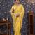 Yellow sequinned embellished saree with blouse piece
