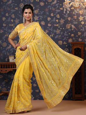 Yellow sequinned embellished saree with blouse piece 4