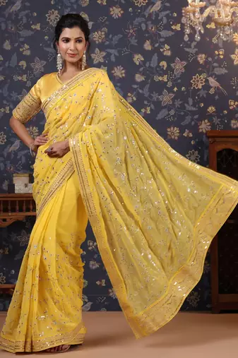 Yellow sequinned embellished saree with blouse piece