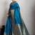 Turquoise rich zari border saree with blouse piece