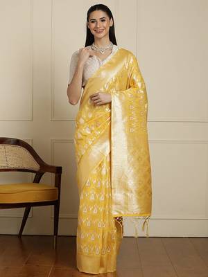 Yellow ethnic motifs woven design muga saree with unstitched blouse 1