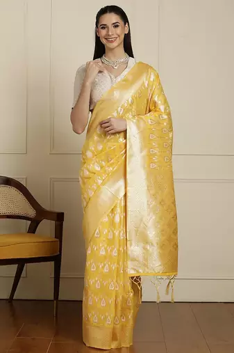 Yellow ethnic motifs woven design muga saree with unstitched blouse