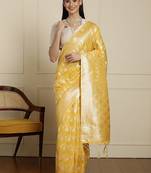 Yellow ethnic motifs woven design muga saree with unstitched blouse