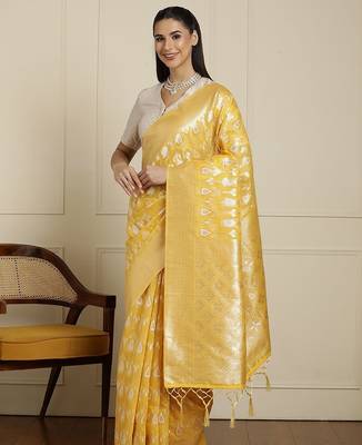 Yellow ethnic motifs woven design muga saree with unstitched blouse 2