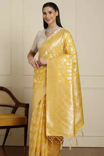 Yellow ethnic motifs woven design muga saree with unstitched blouse