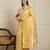 Yellow ethnic motifs woven design muga saree with unstitched blouse