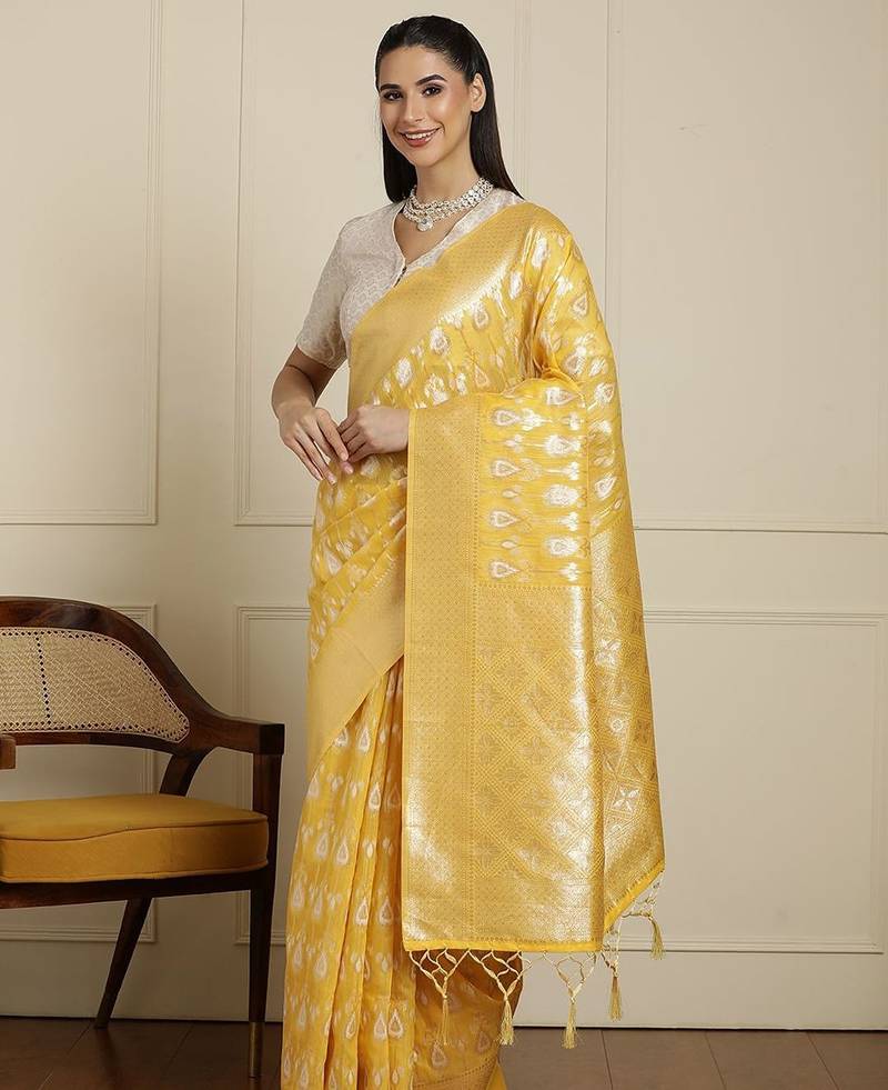 Yellow ethnic motifs woven design muga saree with unstitched blouse