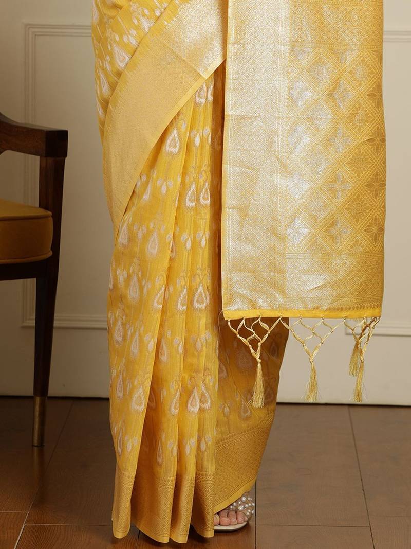 Yellow ethnic motifs woven design muga saree with unstitched blouse
