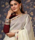 Cream sequinned embellished saree